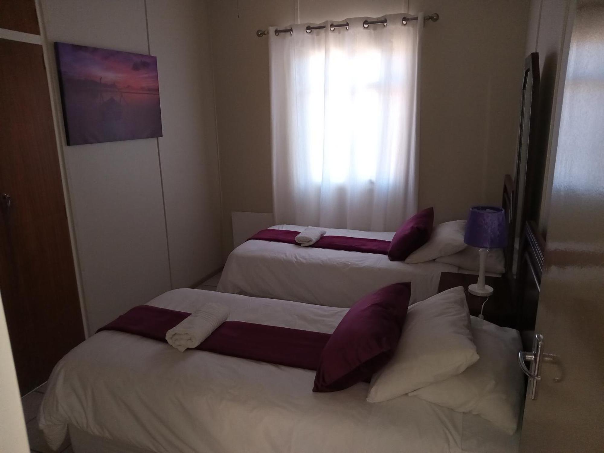 Sunrose Group Of Guesthouses Гарьеп-Дам Экстерьер фото