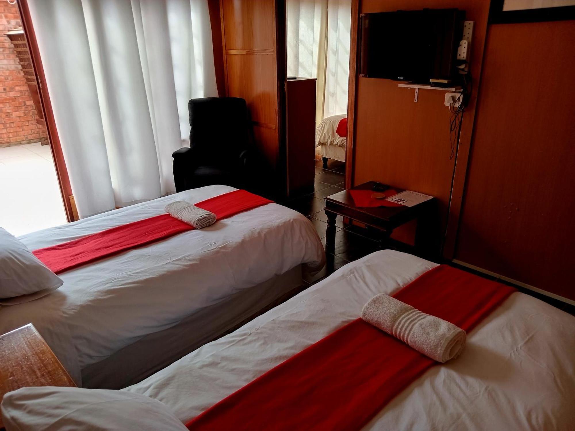 Sunrose Group Of Guesthouses Гарьеп-Дам Экстерьер фото