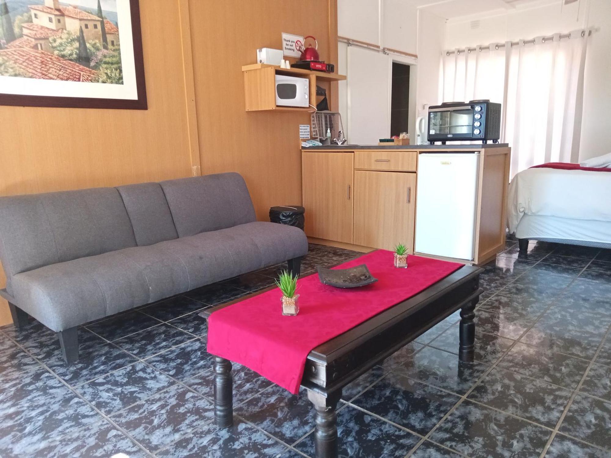 Sunrose Group Of Guesthouses Гарьеп-Дам Экстерьер фото
